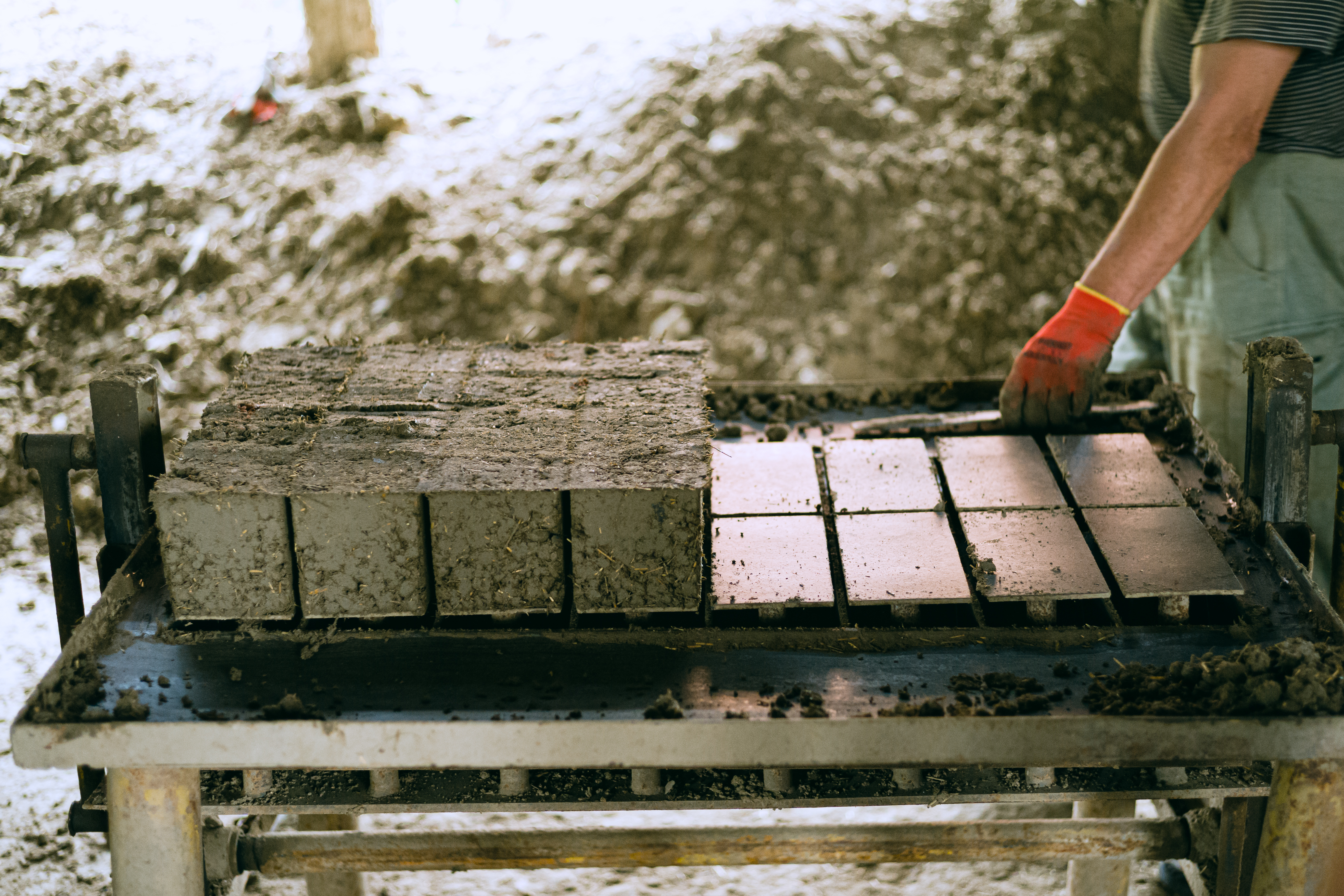 Production of adobe brick